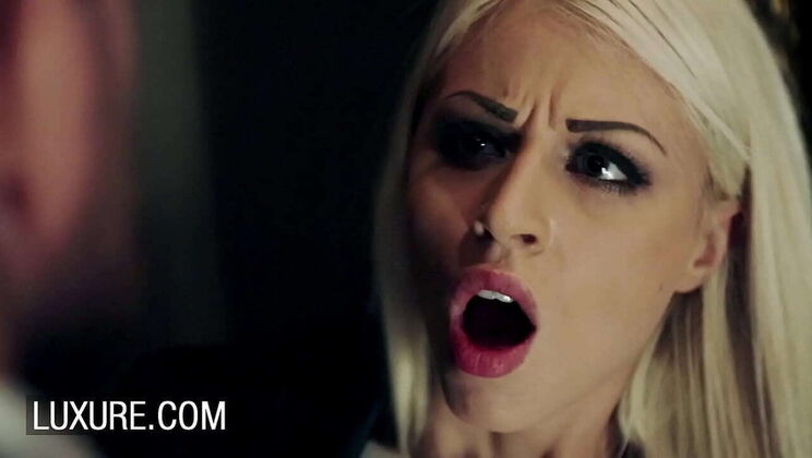 Blonde Chloe Lacourt gives a fast blowjob in the ladies room