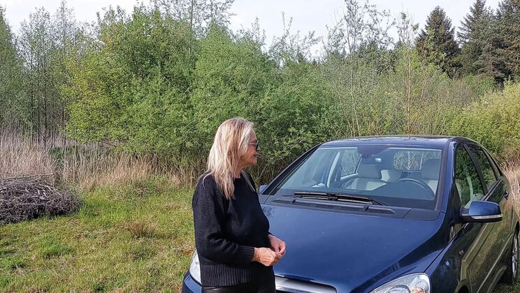 Granny with Big Natural Tits Plays with Her Breasts in Car